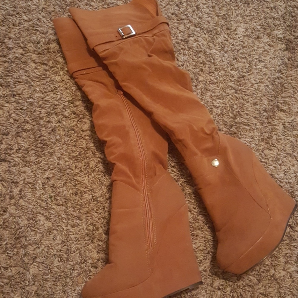 Knee high wedge boots